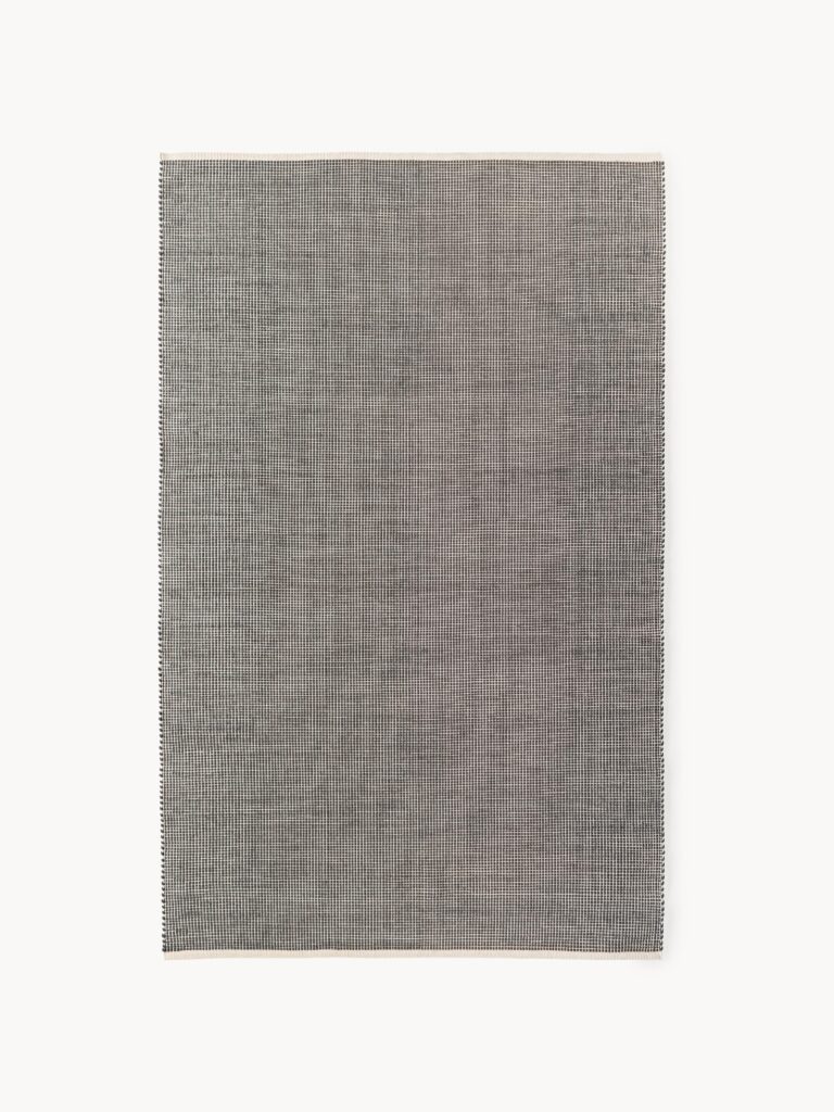 Rankų darbo vilnos kilimas Amaro, 200x300 cm, šviesiai smėlinės ir pilkos spalvos, minimalistinio dizaino, matomas iš viršaus.